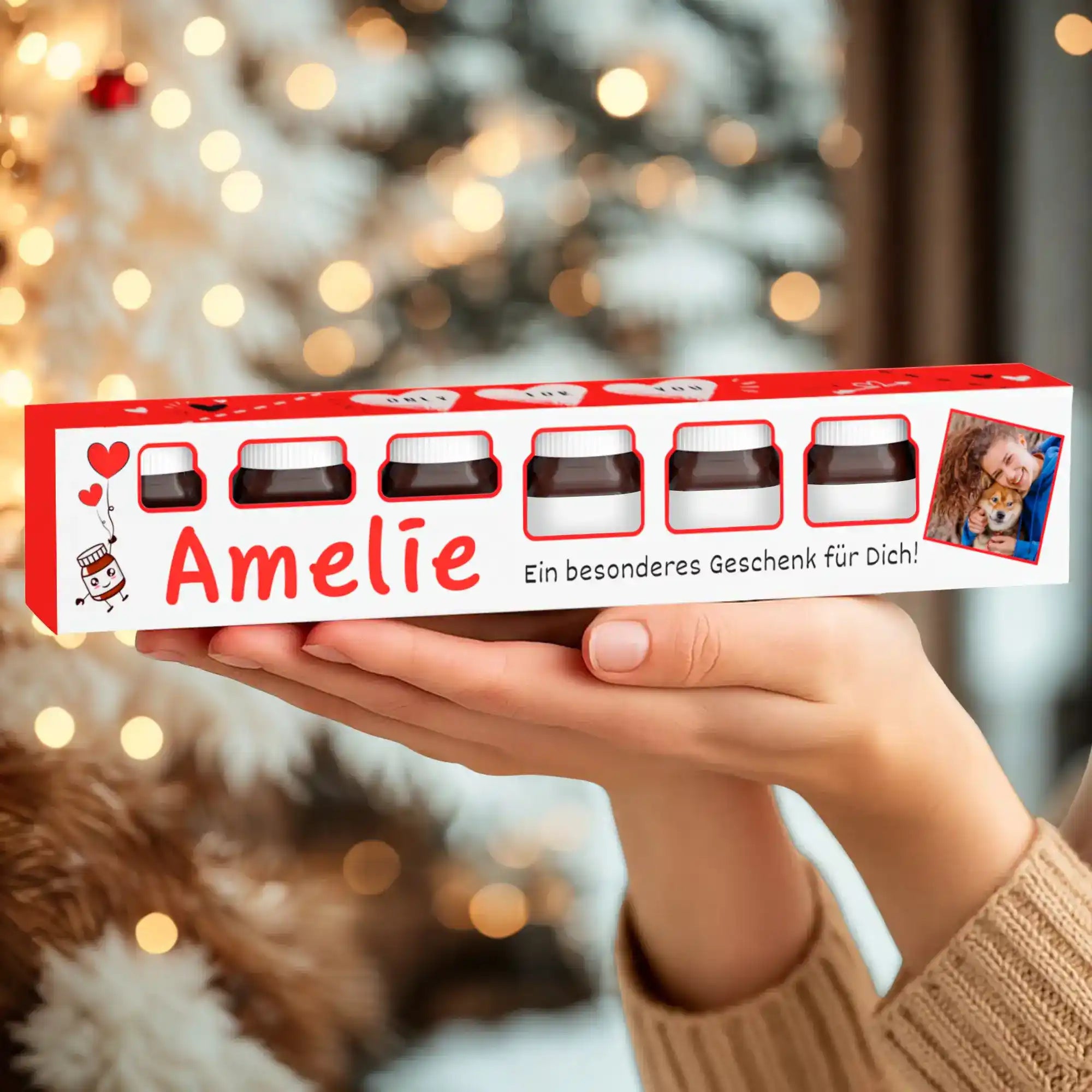 Personalisierte Geschenkbox mit sieben Mini-Gläsern Nuss-Nougat-Creme – liebevoll gestaltet mit Namen und Foto, ideal als süßes Weihnachtsgeschenk.