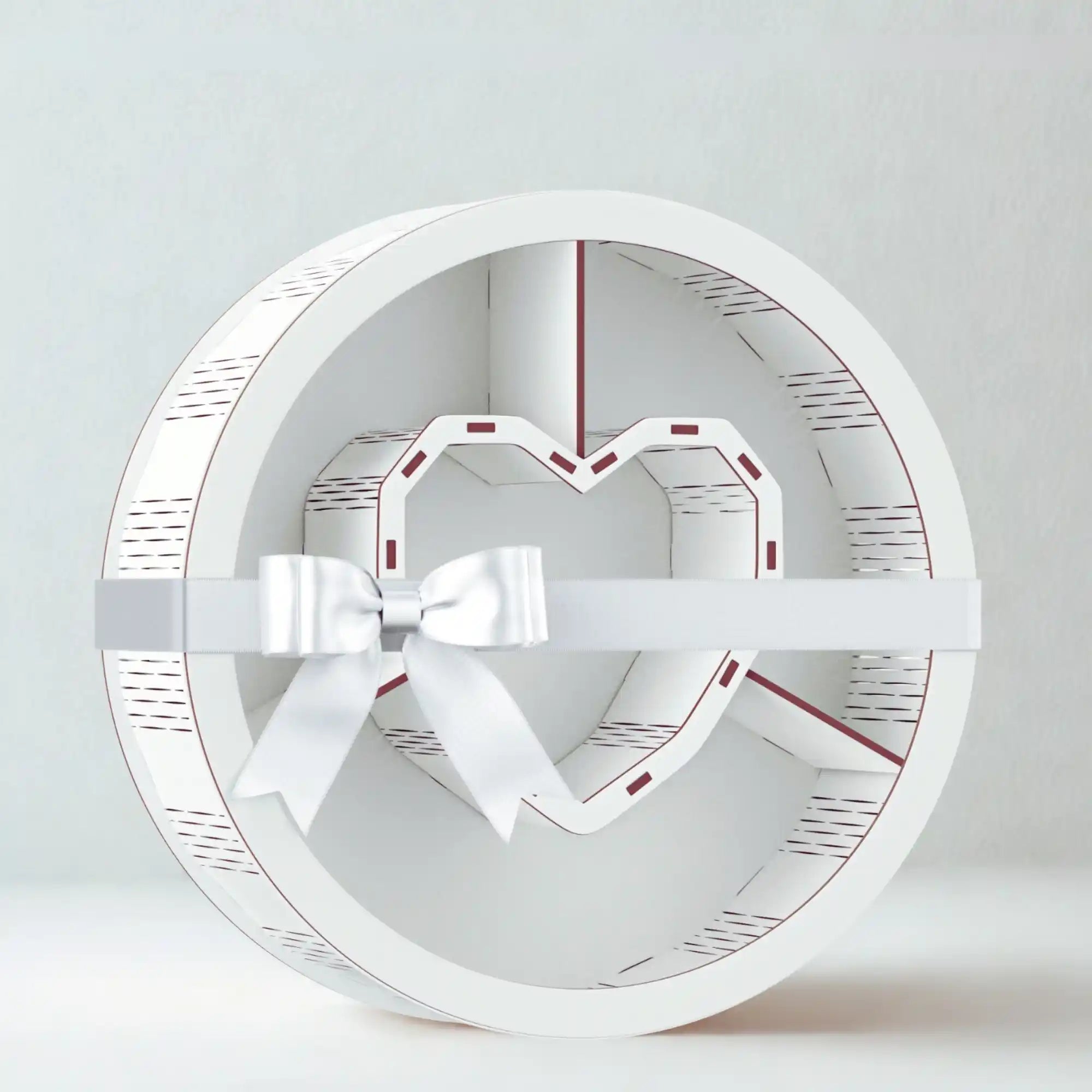 Leere weiße Geschenkbox mit Herz-Einsatz und Schleife – perfekt für kreative DIY-Geschenke oder Dekoideen.