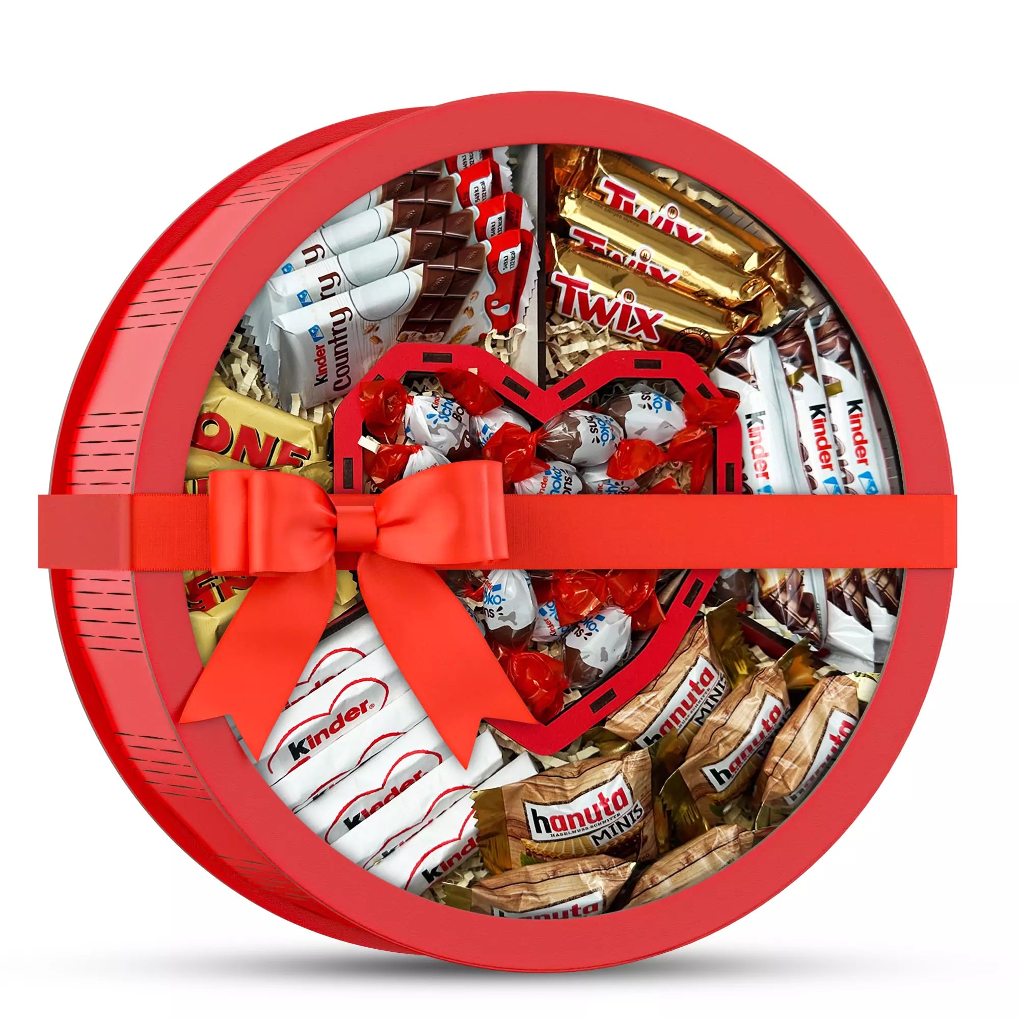 Runde Geschenkbox in Rot mit Herzfach und roter Schleife, gefüllt mit verschiedenen Süßigkeiten – liebevolles Geschenk für Geburtstag, Valentinstag oder besondere Anlässe.