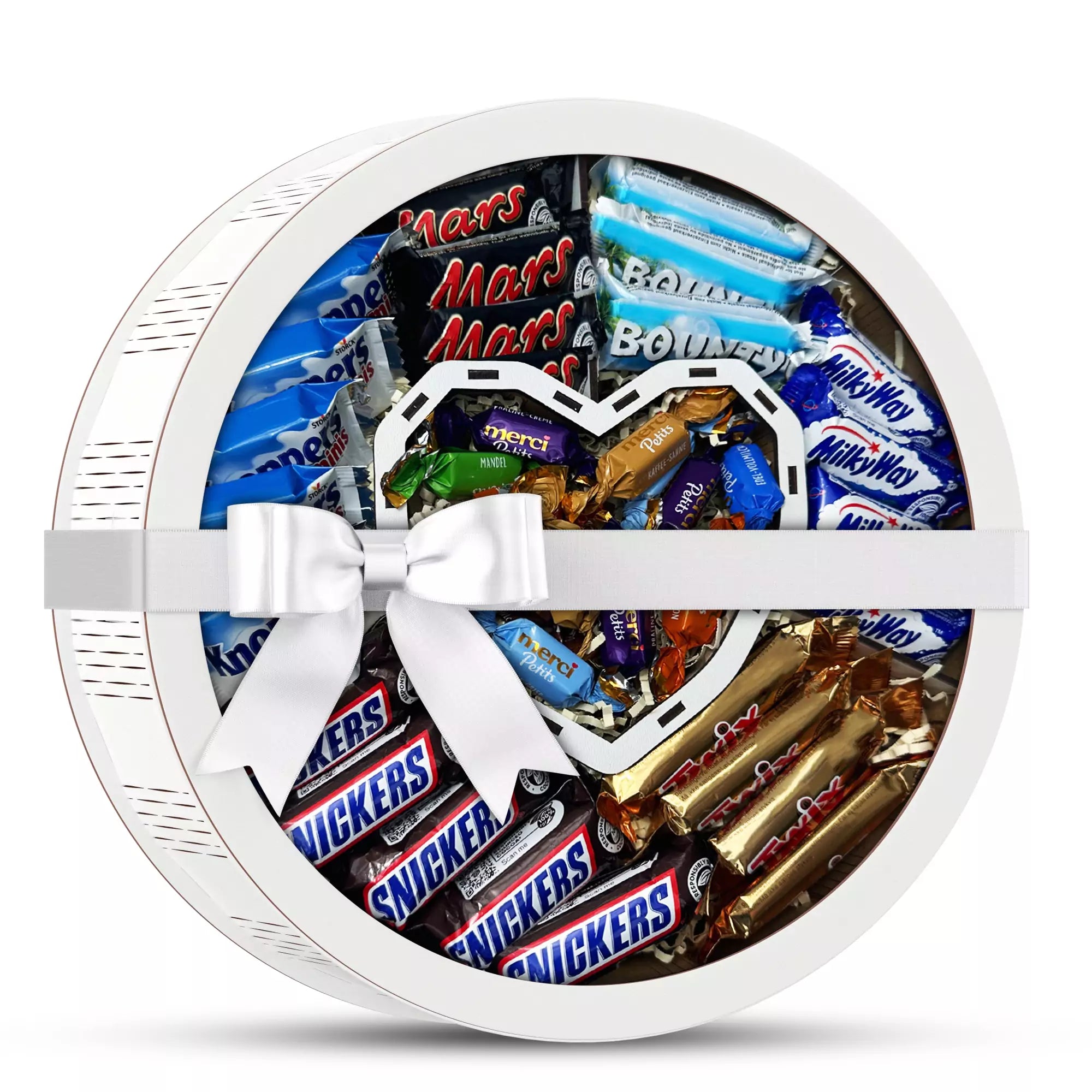 Runde weiße Geschenkbox mit Herz-Einsatz und Schleife, gefüllt mit beliebten Schokoriegeln – stilvolle Geschenkidee für jeden Anlass.